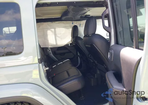 2024 Jeep Wrangler 4-Door Sahara 4X4 from USA, damaged, VIN 1C4PJXEG2RW377739